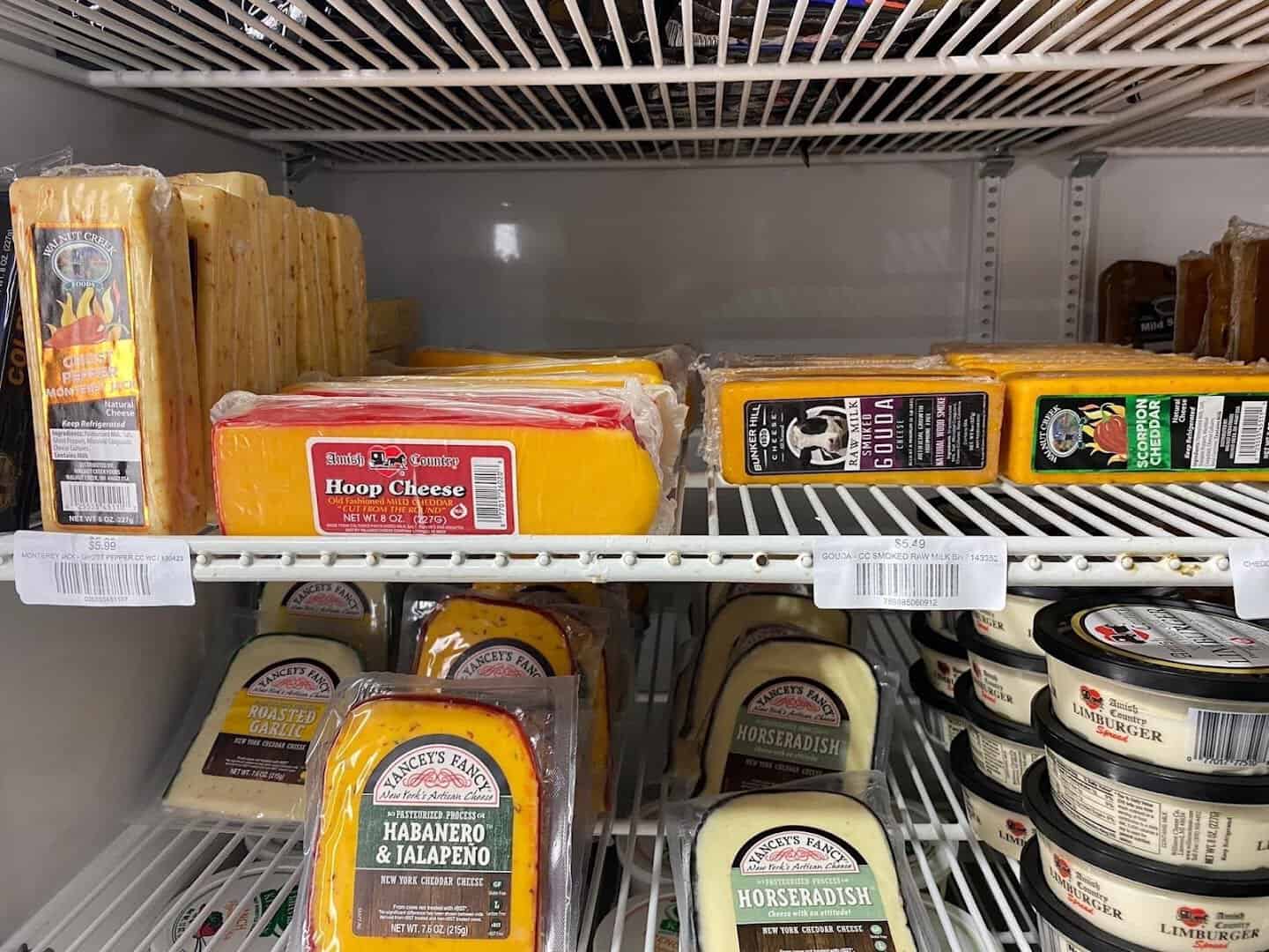 Artisan cheeses in the cooler at Veal Station Amish Market near Springtown, Texas
