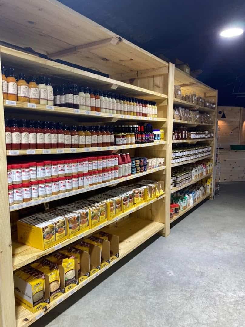 Grocery aisle of sauces and condiments at Veal Station Amish Market, Texas