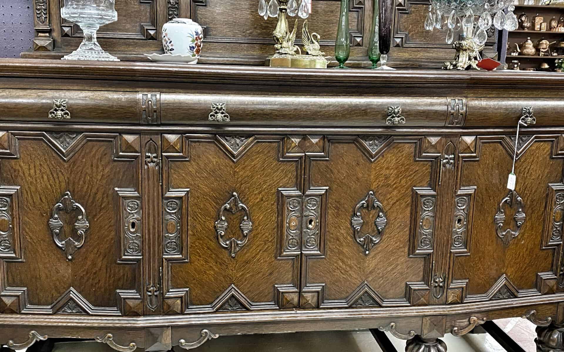 Carved wooden antique sideboard buffet at The Antique Gallery of Houston in Spring, Texas