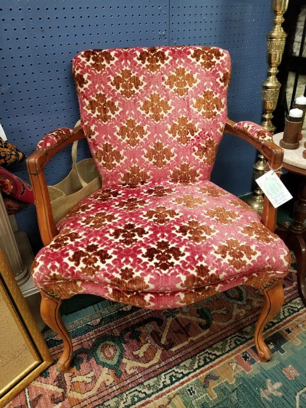 Pink patterned vintage upholstered armchair for sale at The Antique Gallery of Houston in Spring, Texas