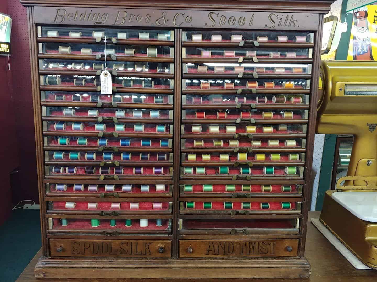 Antique Belding Brothers spool silk thread cabinet at a Fort Worth antique mall