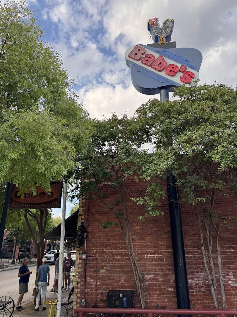 Babe's Chicken Dinner House sign on the historic downtown building in Roanoke, Texas