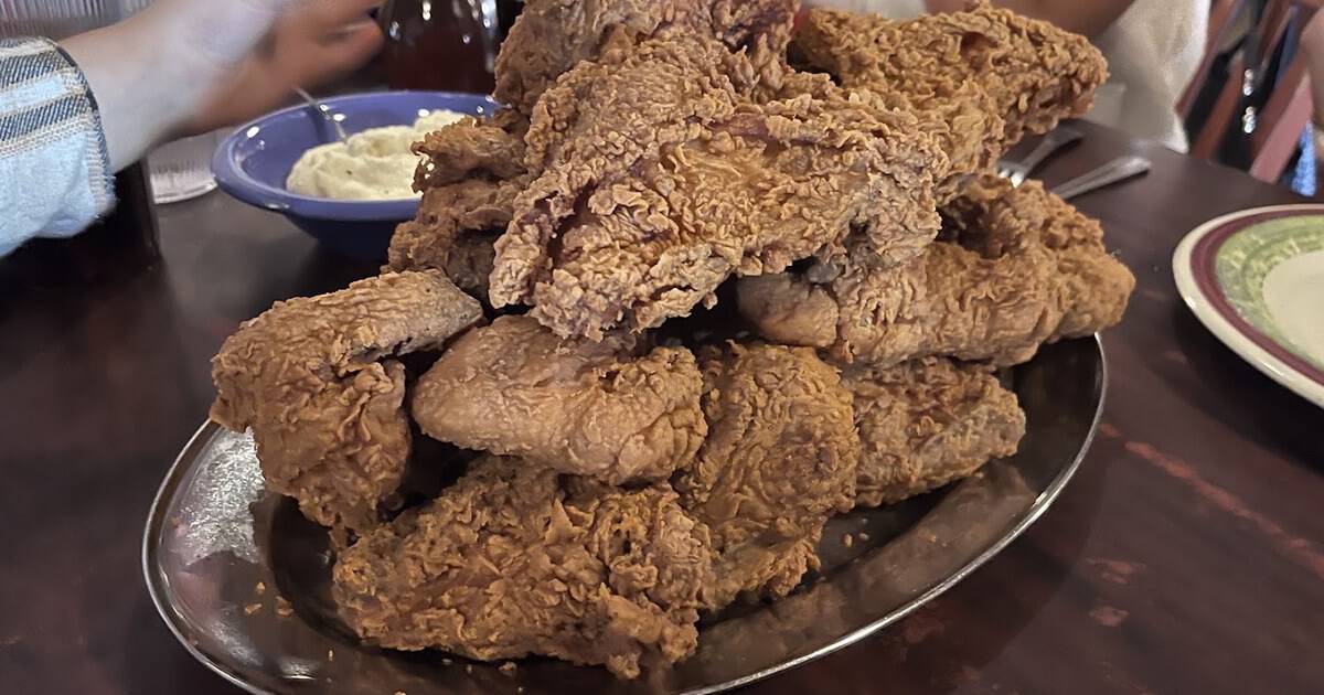 This Old-Fashioned Texas Dinner House Piles Your Table With All-You-Can-Eat Fried Chicken and Honey Biscuits