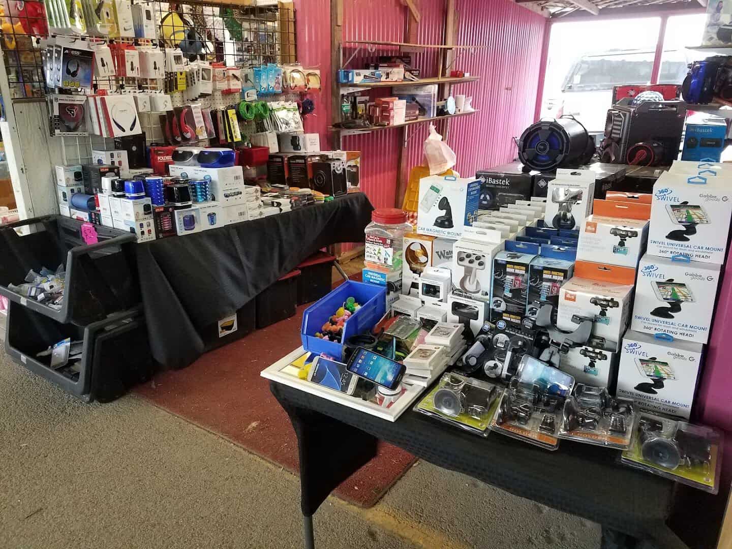 Vendor table packed with bargain goods at Austin Country Flea Market