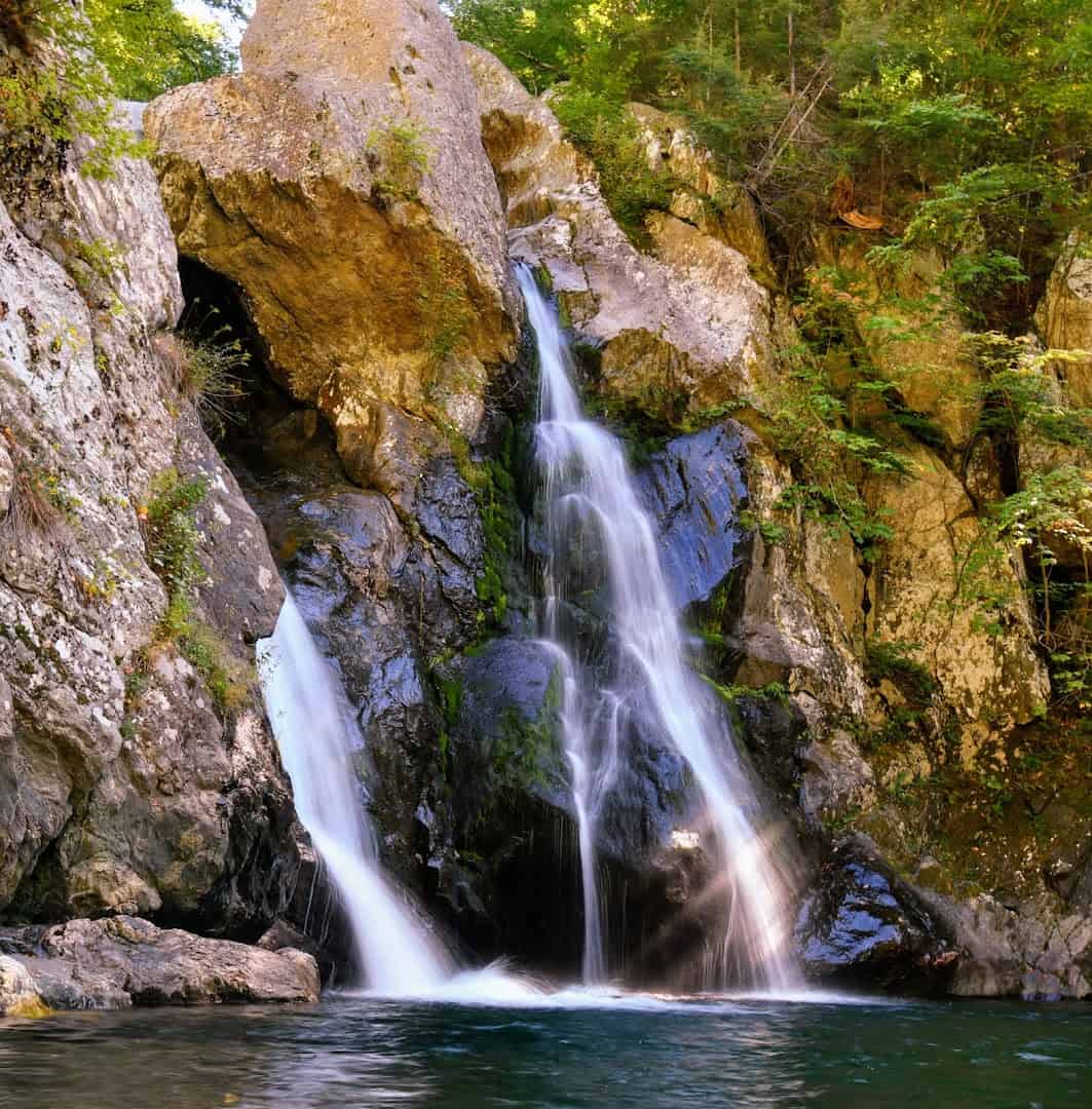 Bash Bish Falls framed by autumn foliage in the Berkshires, Massachusetts