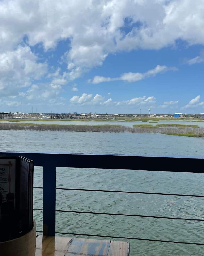 Bay view from the deck railing at Paradise Key in Rockport, Texas