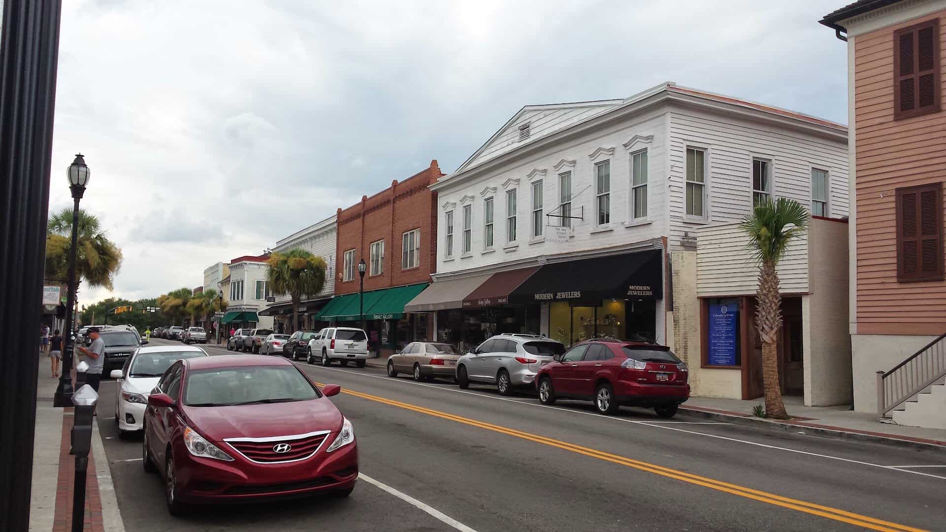 Storefronts and palms along Bay Street in downtown Beaufort, South Carolina
