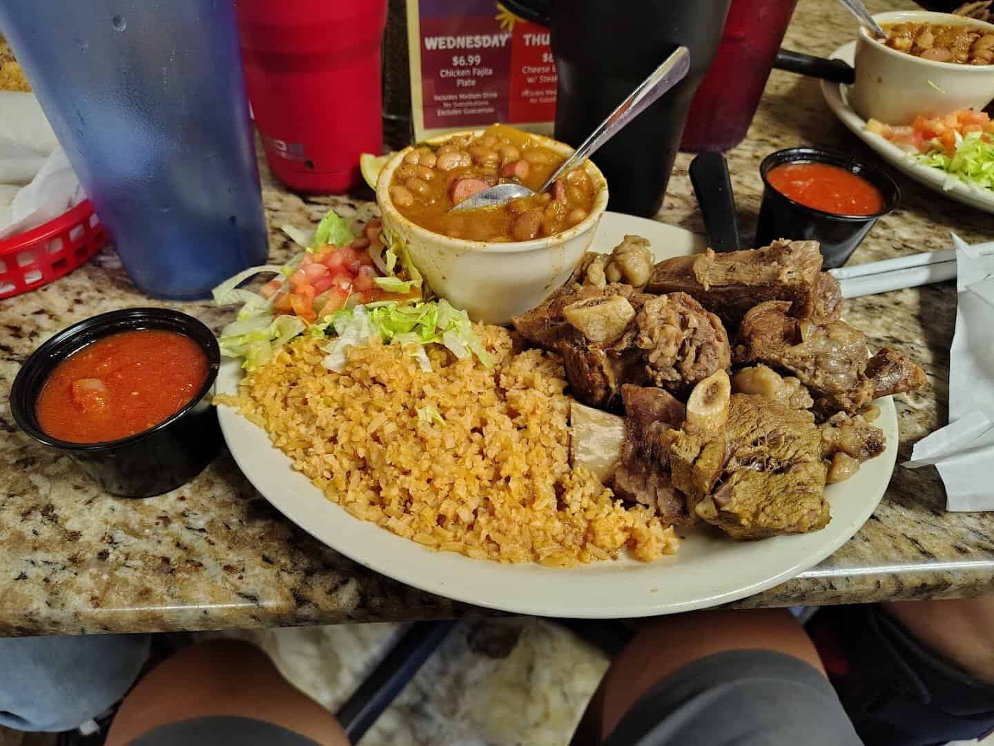 Plate of beef with Mexican rice and charro beans at Eddie's Taco House