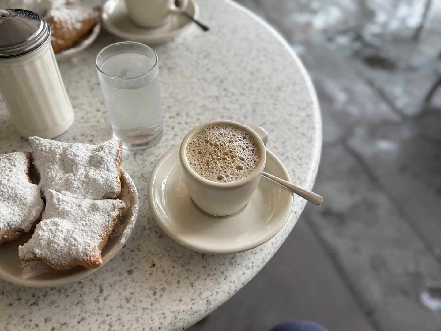 beignets and cafe au lait at Cafe du Monde in New Orleans