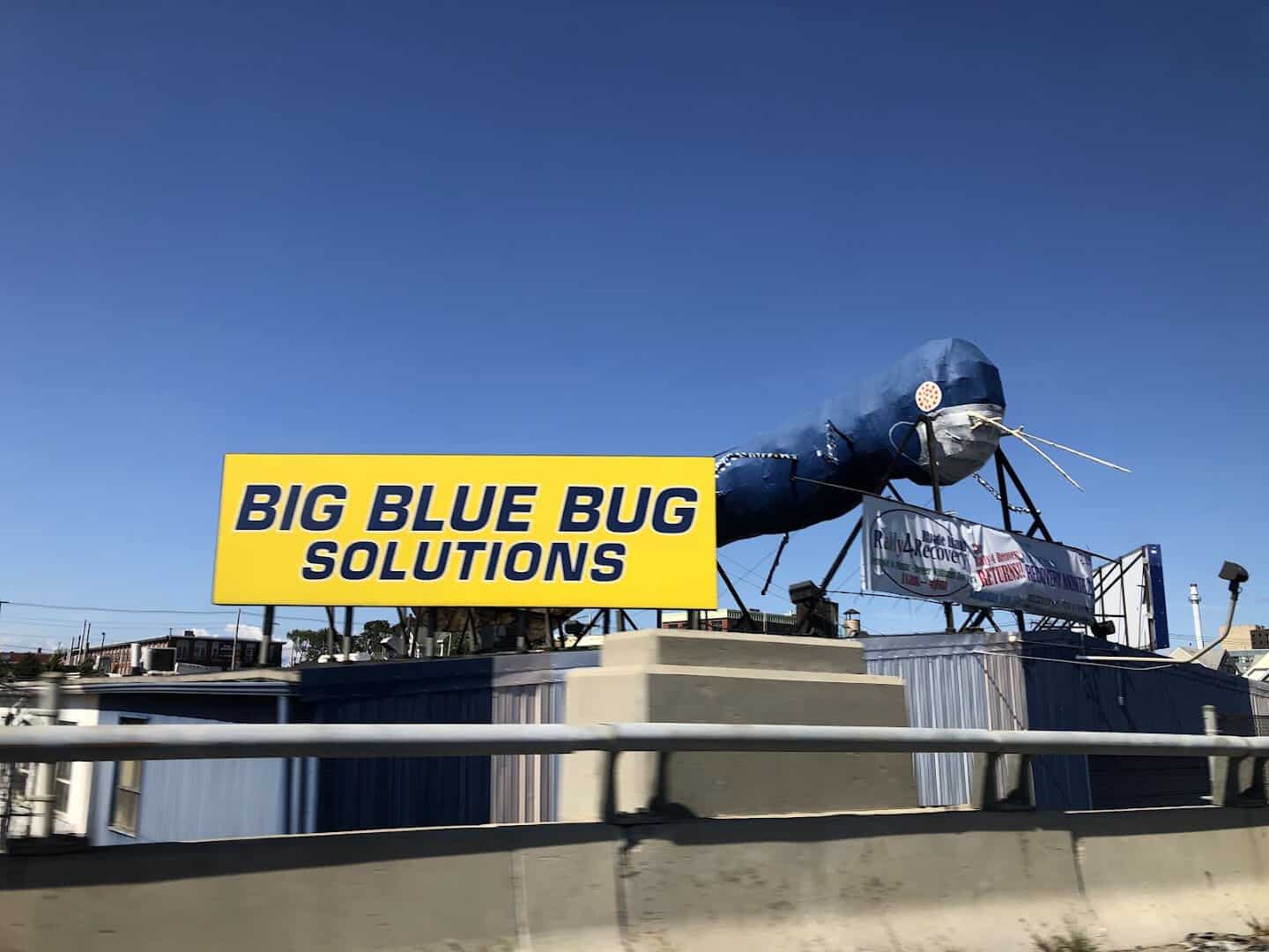 The Big Blue Bug termite sculpture over I-95 in Providence, Rhode Island