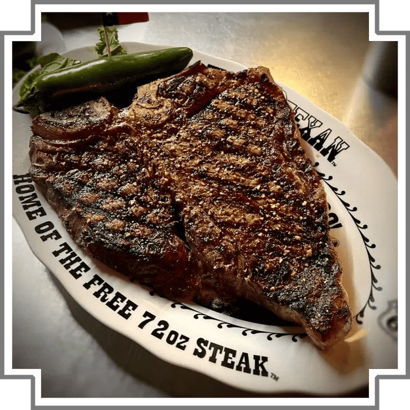 Grilled steak on a Home of the Free 72oz Steak plate at The Big Texan in Amarillo, Texas