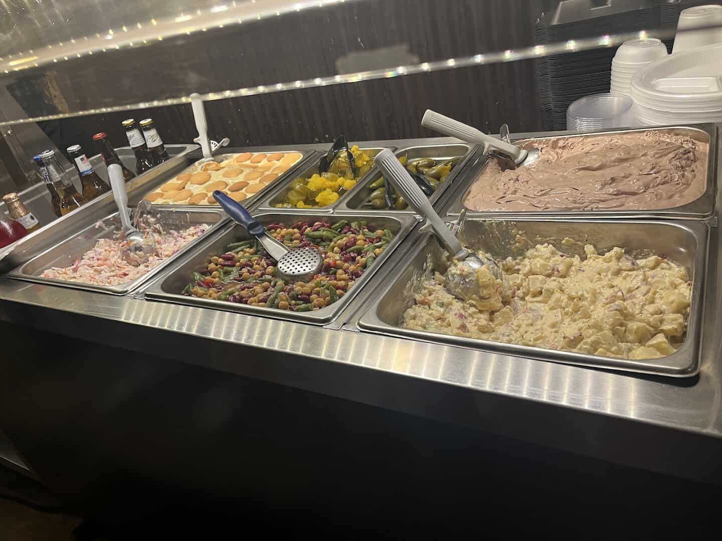 Barbecue sides including mac and cheese, beans and potato salad at Black's Barbecue in Lockhart, Texas