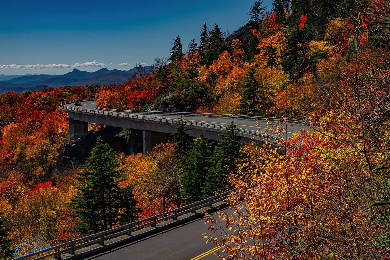 The Linn Cove Viaduct curving through autumn foliage on the Blue Ridge Parkway, North Carolina