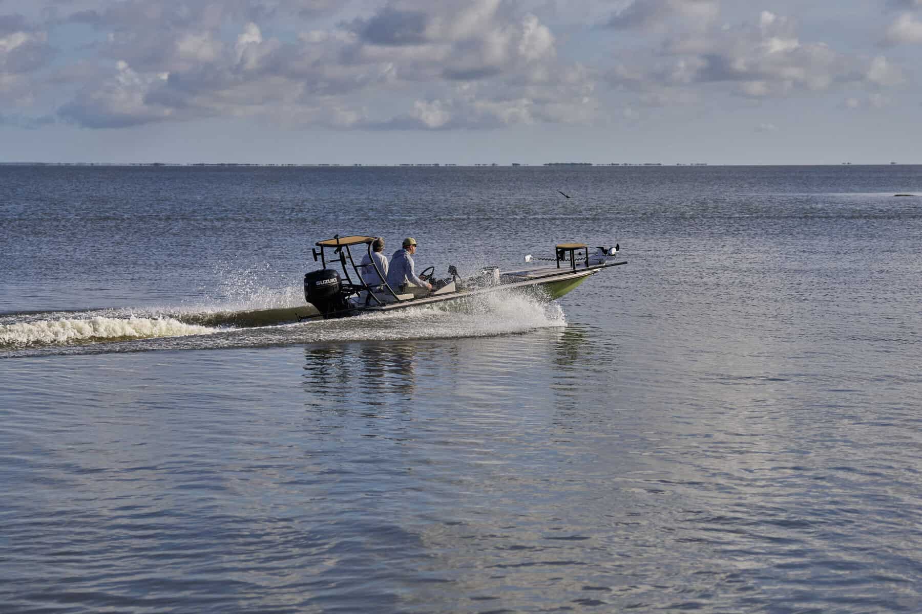 A boat on Galveston Bay seen from Stingaree Restaurant in Crystal Beach