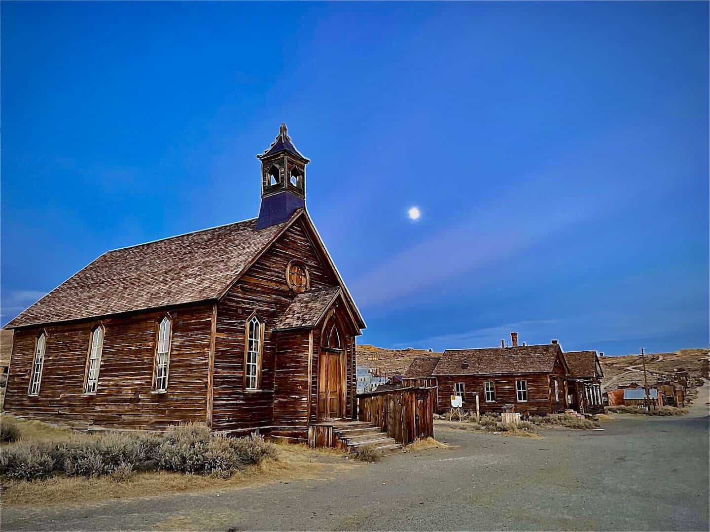 Weathered wooden church standing at the Bodie ghost town in California