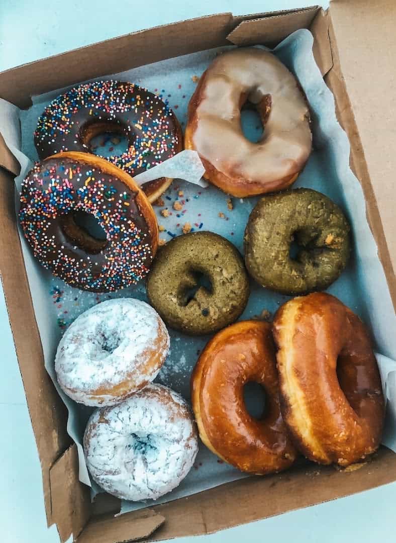 Box of assorted glazed donuts at Round Rock Donuts in Round Rock, Texas