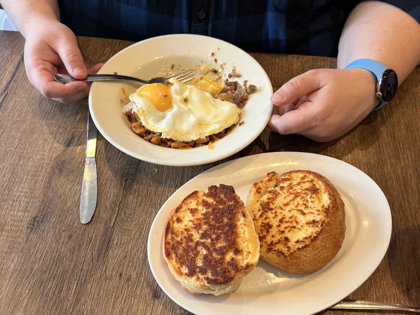 A breakfast plate of eggs and Texas toast at Bobbie's Southern Kitchen in San Antonio