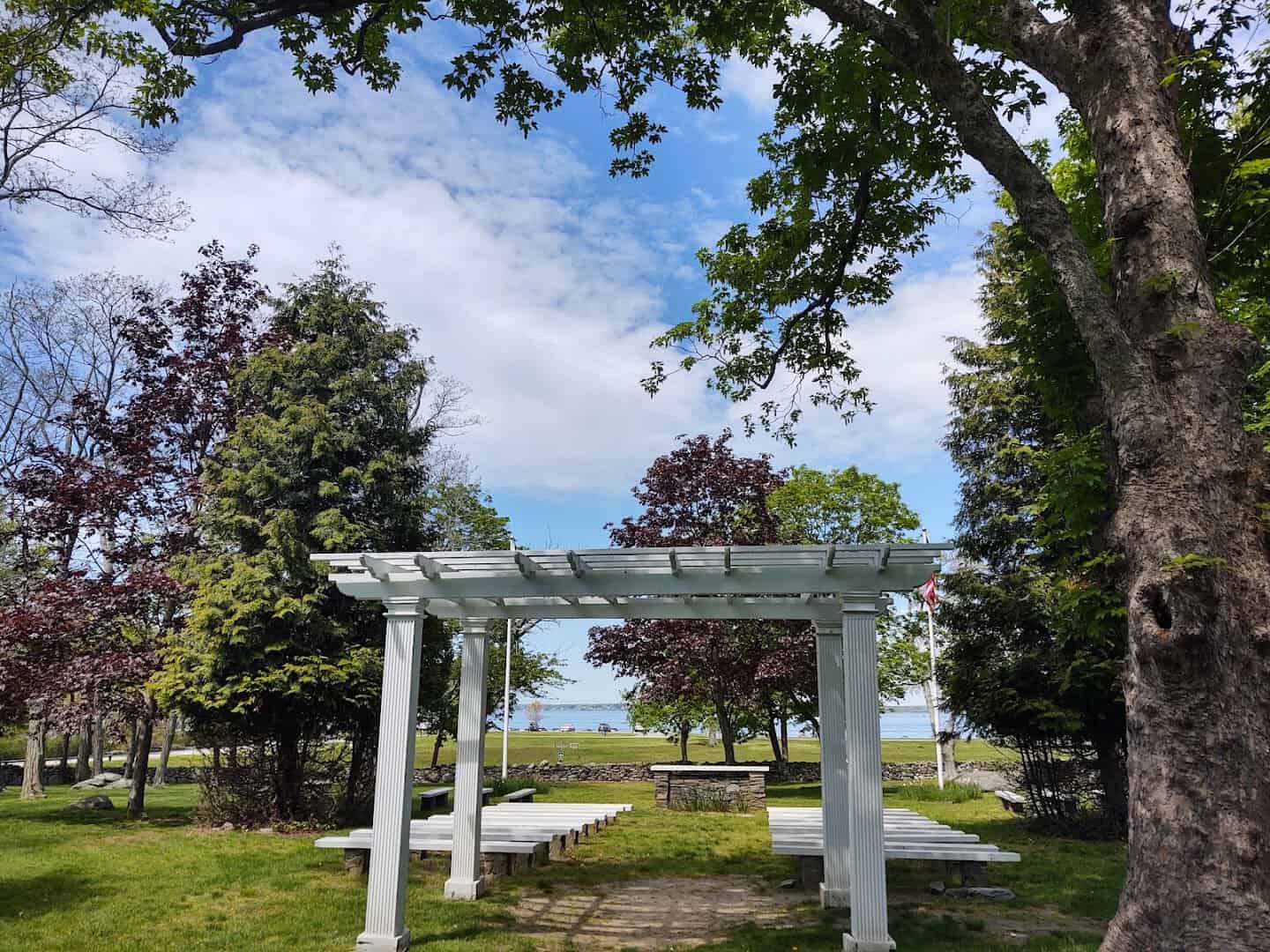 Lawns and shade trees at Colt State Park in Bristol, Rhode Island