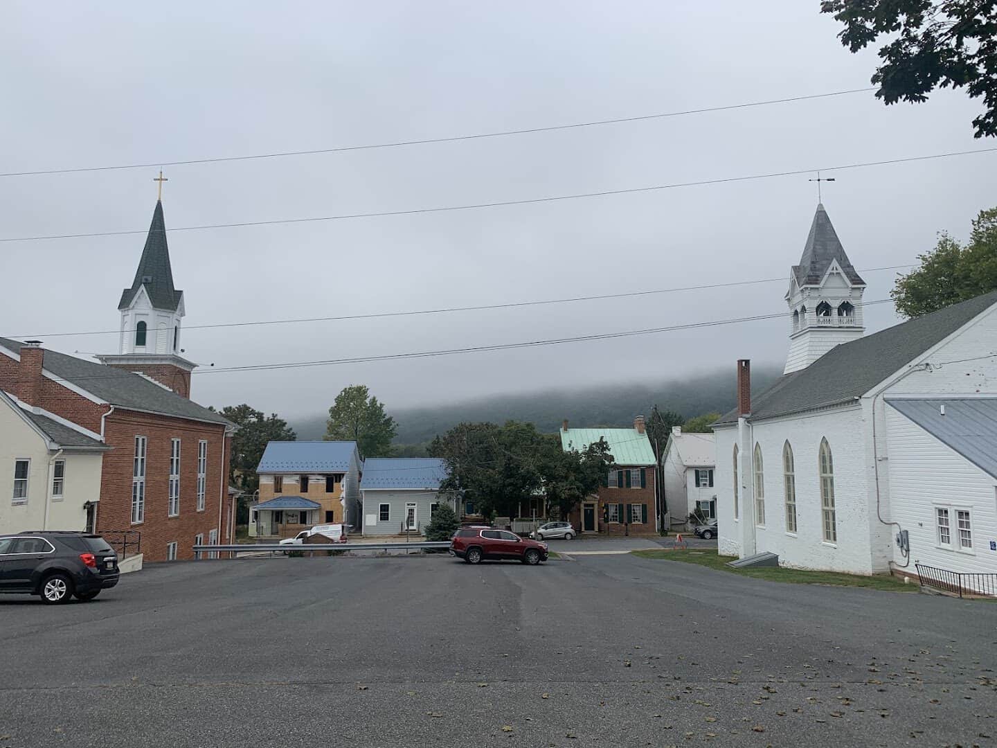 Historic churches below misty South Mountain in Burkittsville, Maryland