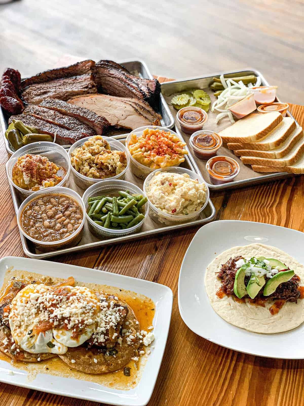 Barbecue platter with brisket, sides and tacos at Burnt Bean Co in Seguin, Texas