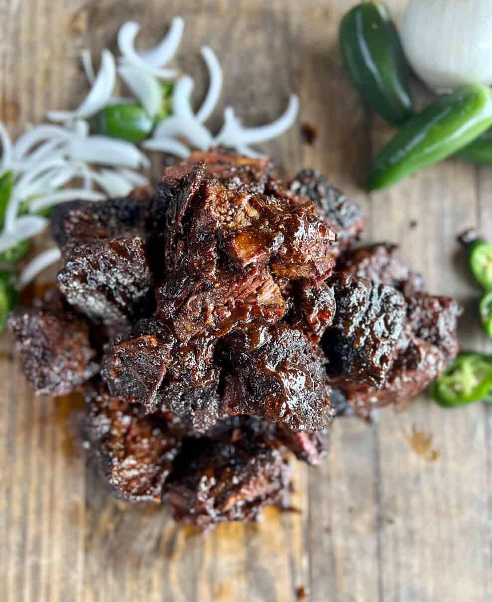 Sticky barbecue burnt ends with jalapenos at Pecan Lodge in Dallas