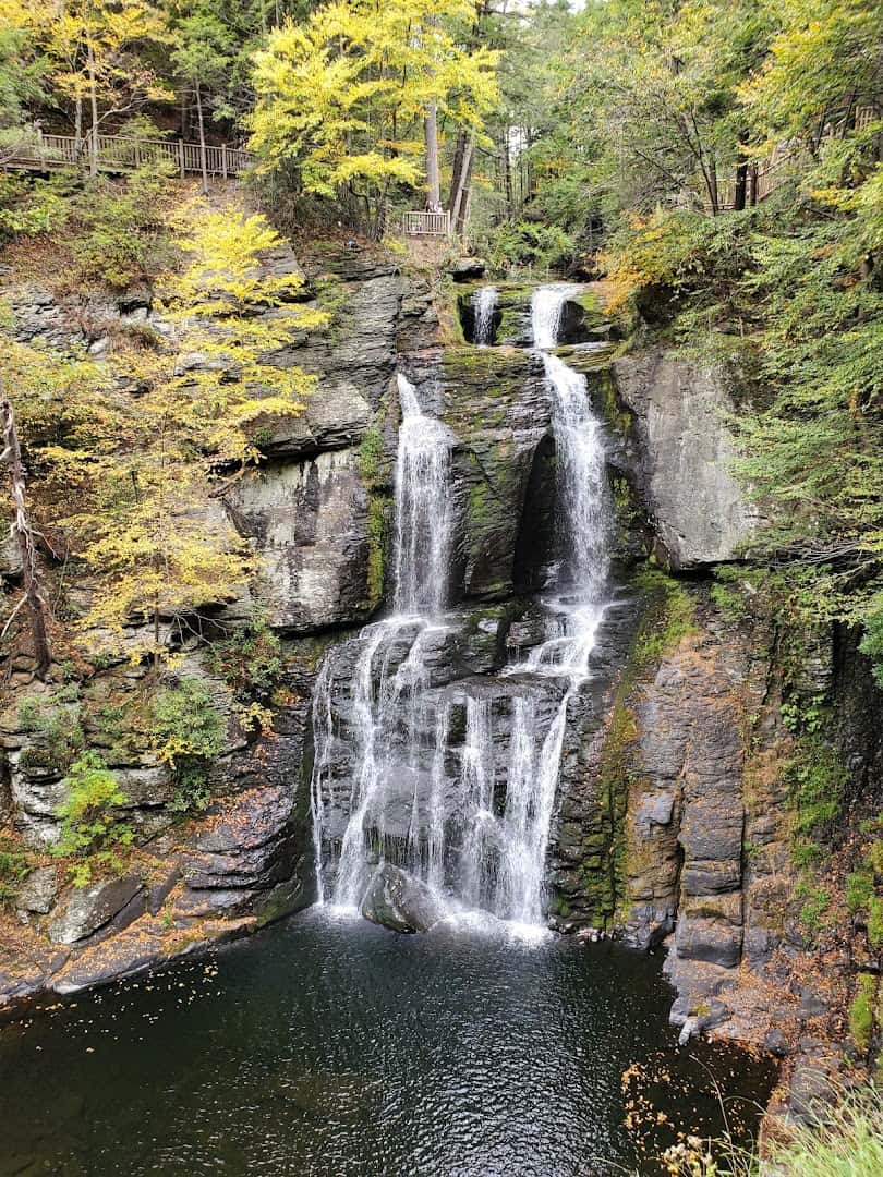 Bushkill Falls framed by golden fall foliage in the Poconos, Pennsylvania
