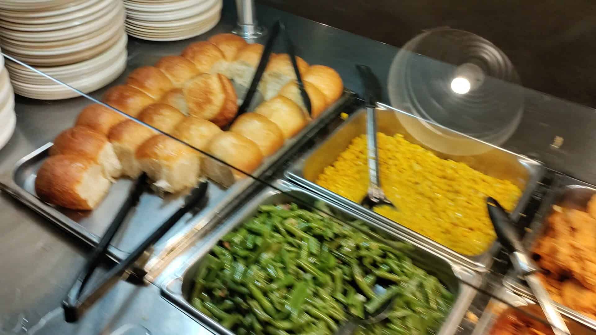 Dinner rolls, mac and cheese and green beans on the buffet at Butter Churn in Aransas Pass, Texas