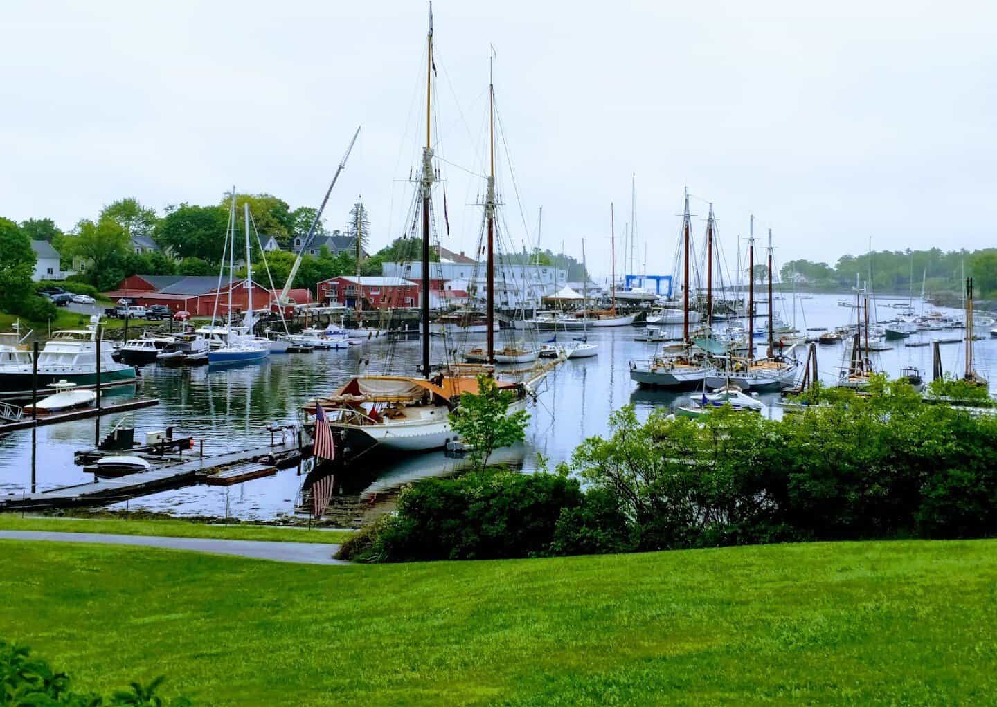 Camden Harbor with sailboats and the town of Camden, Maine