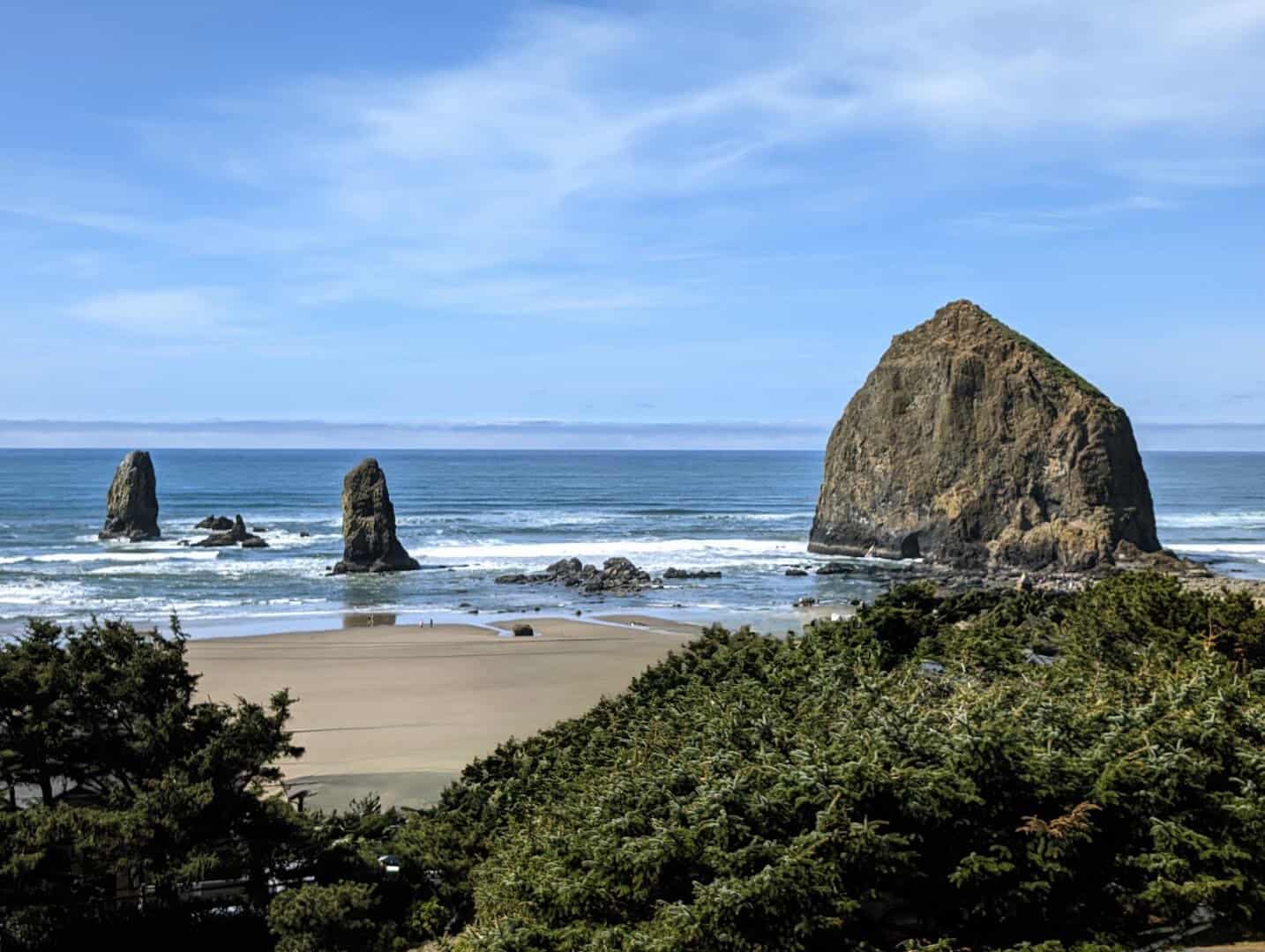 Haystack Rock rising from the surf at Cannon Beach, Oregon