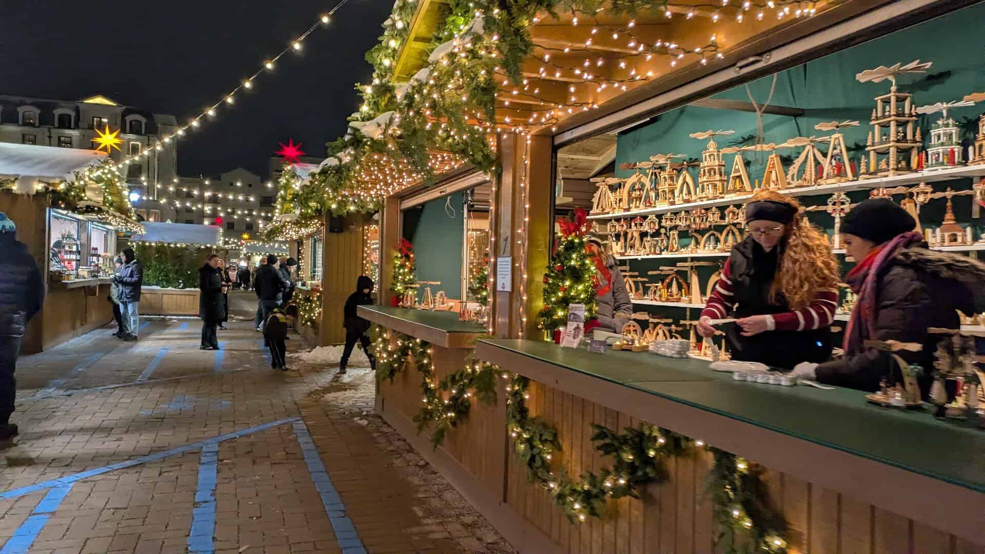 Glowing market stalls at night at the Carmel Christkindlmarkt in Indiana