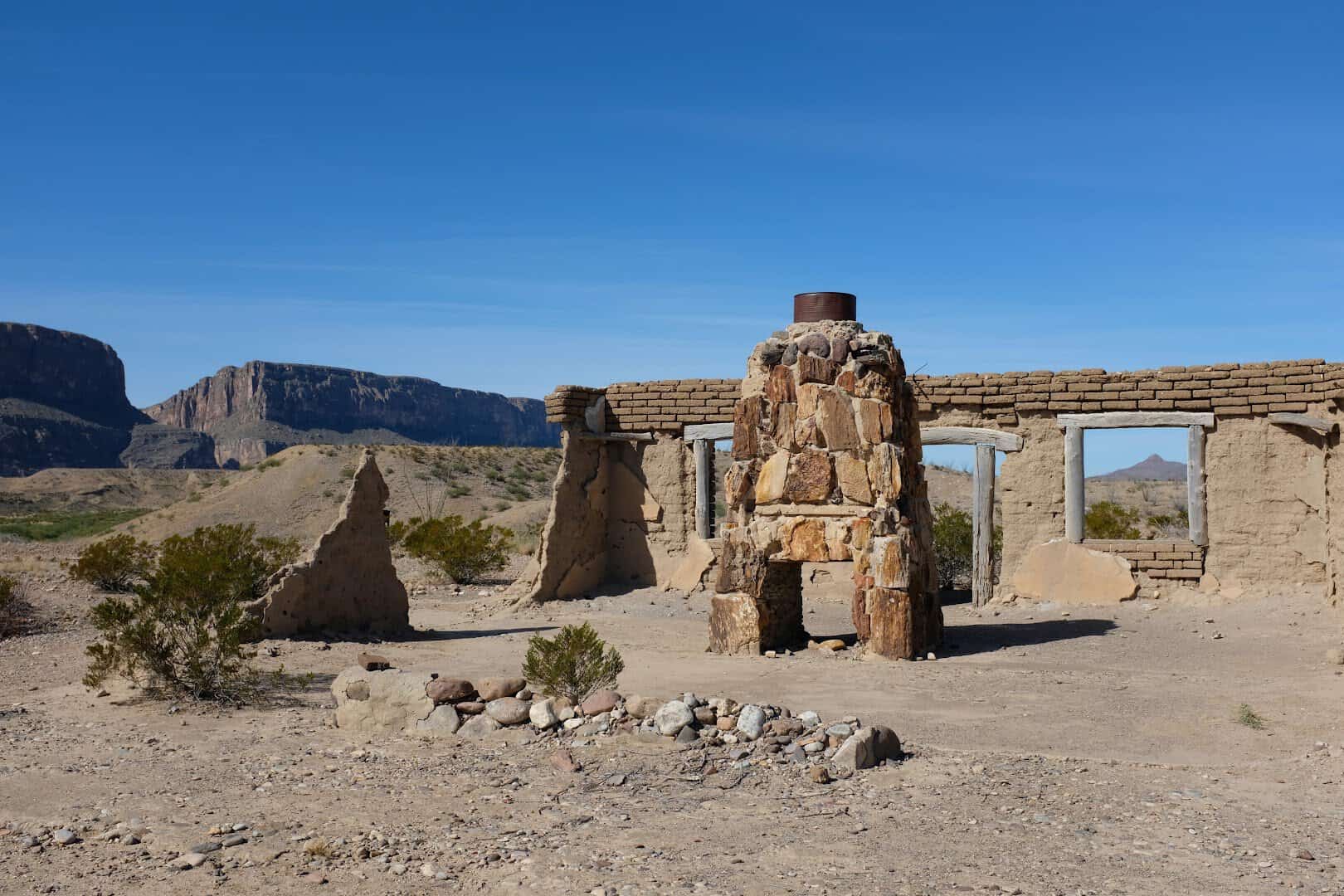 Historic adobe ruins near Castolon with canyon country beyond in Big Bend National Park