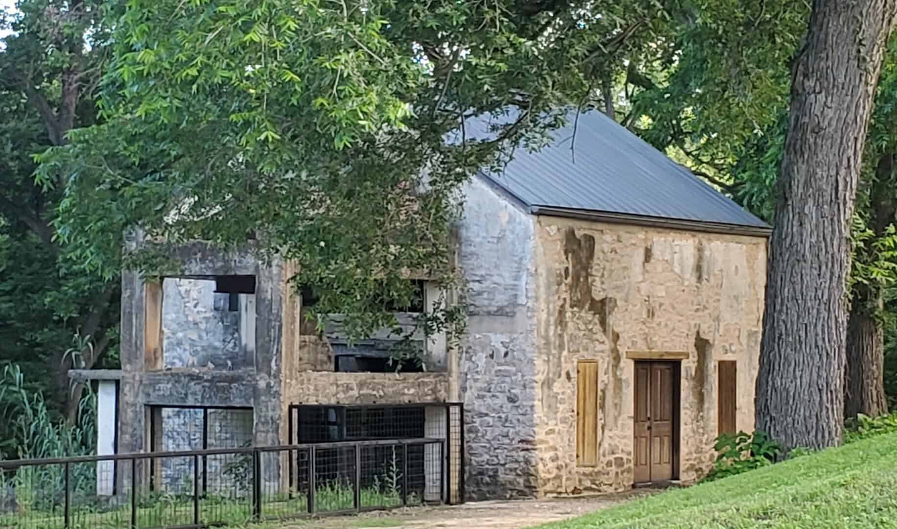 Historic limestone grist mill on the Landmark Inn grounds in Castroville, Texas