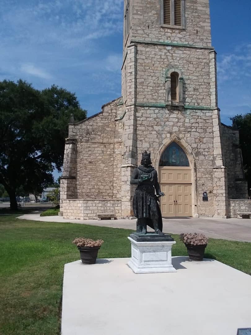 Stone Gothic bell tower of St. Louis Catholic Church in Castroville, Texas