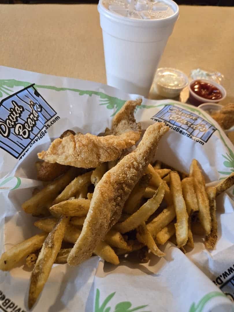 Fried catfish strips with fries in a David Beards basket at Catfish King in Waco, Texas