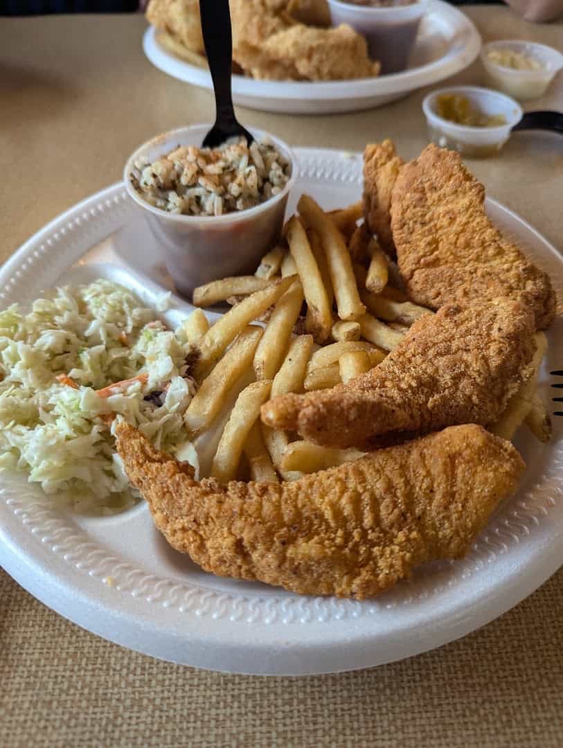Fried catfish dinner with fries and coleslaw at Catfish King in Waco, Texas