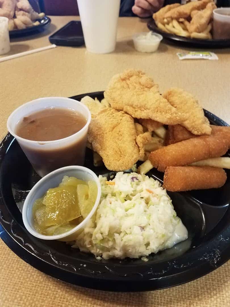 Fried catfish with hushpuppies, coleslaw and green tomato relish at Catfish King in Waco, Texas