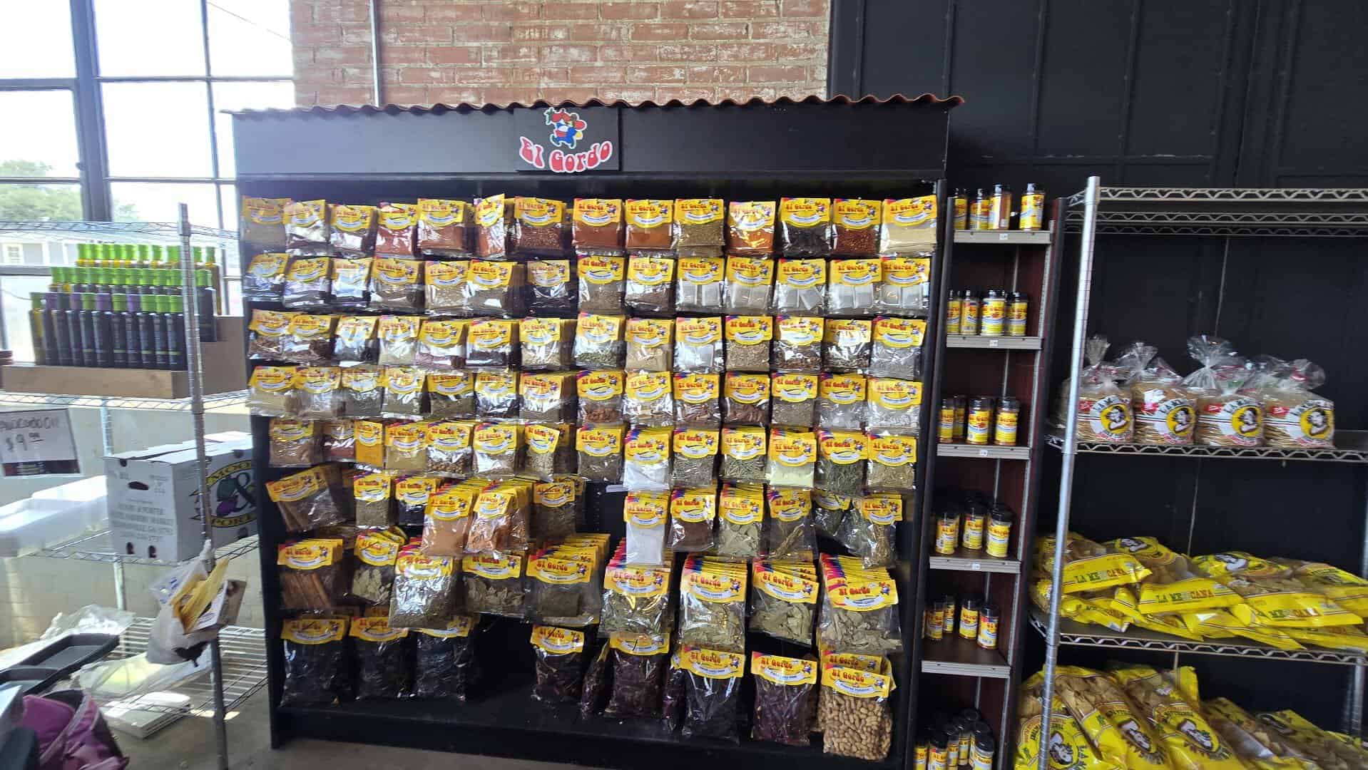 Shelves of chips, snacks and pantry goods at The Cedar Market Ranch in Dallas