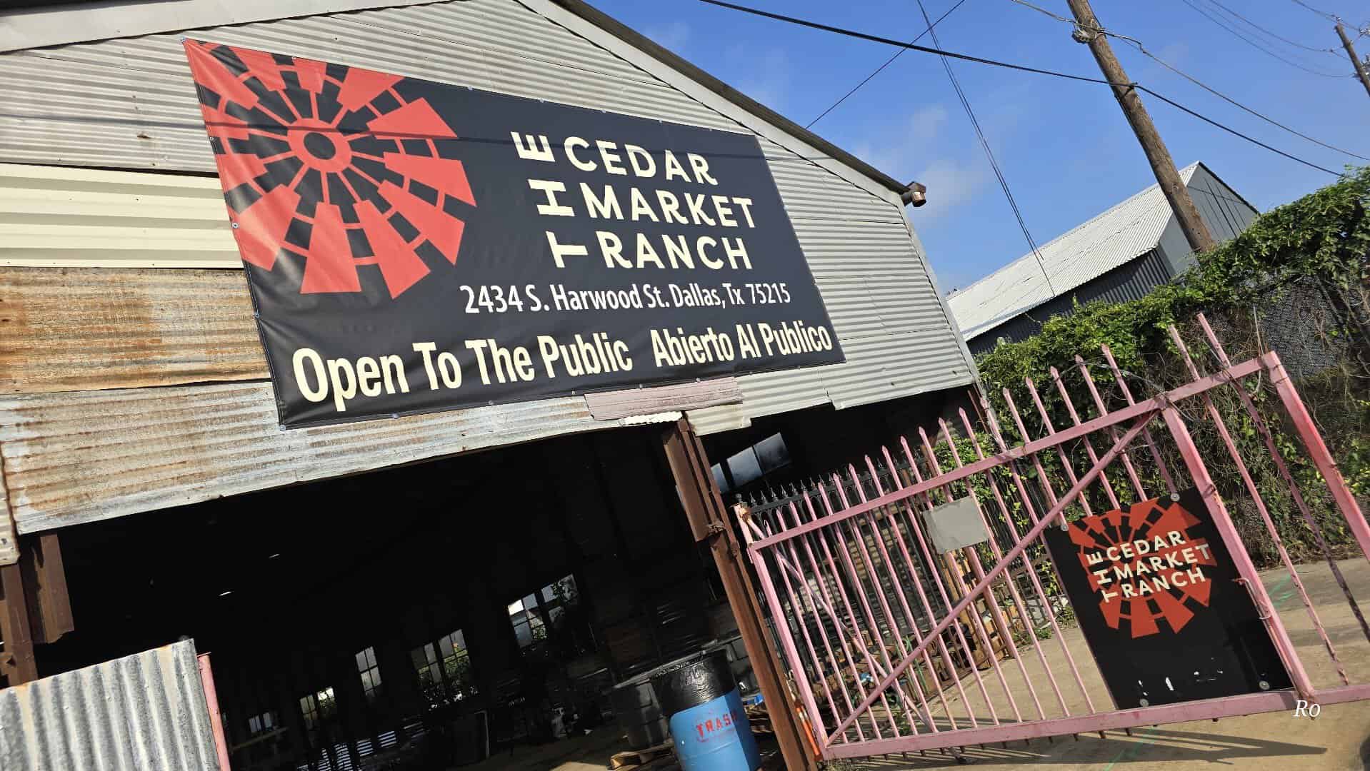 The Cedar Market Ranch sign on its metal warehouse in the Cedars neighborhood of Dallas