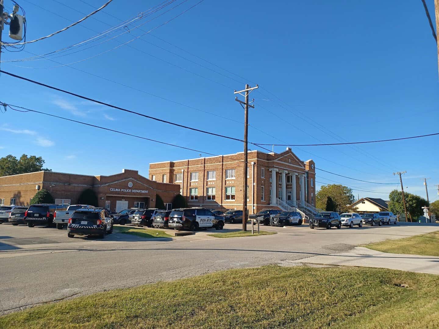 A historic early-1900s brick building on the square in Celina, Texas