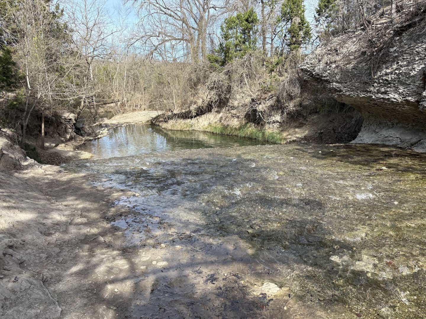 Shallow cascade over chalky limestone shelves at Chalk Ridge Falls near Belton, Texas