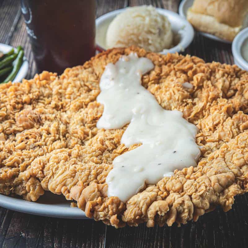 Chicken fried steak with cream gravy at Goodson's Cafe in Tomball, Texas