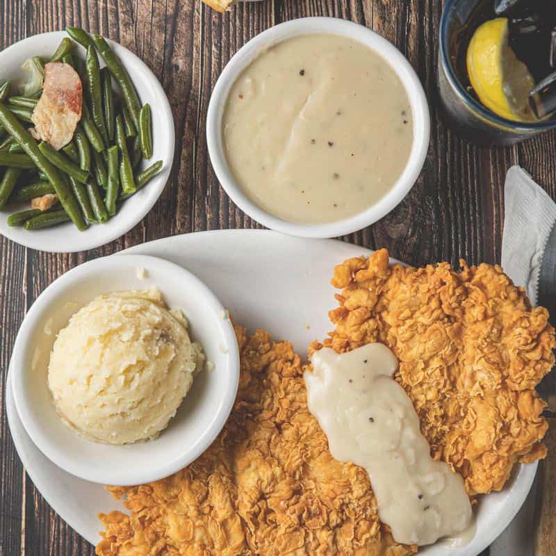 Chicken fried steak plate with mashed potatoes and gravy at Goodson's Cafe in Tomball