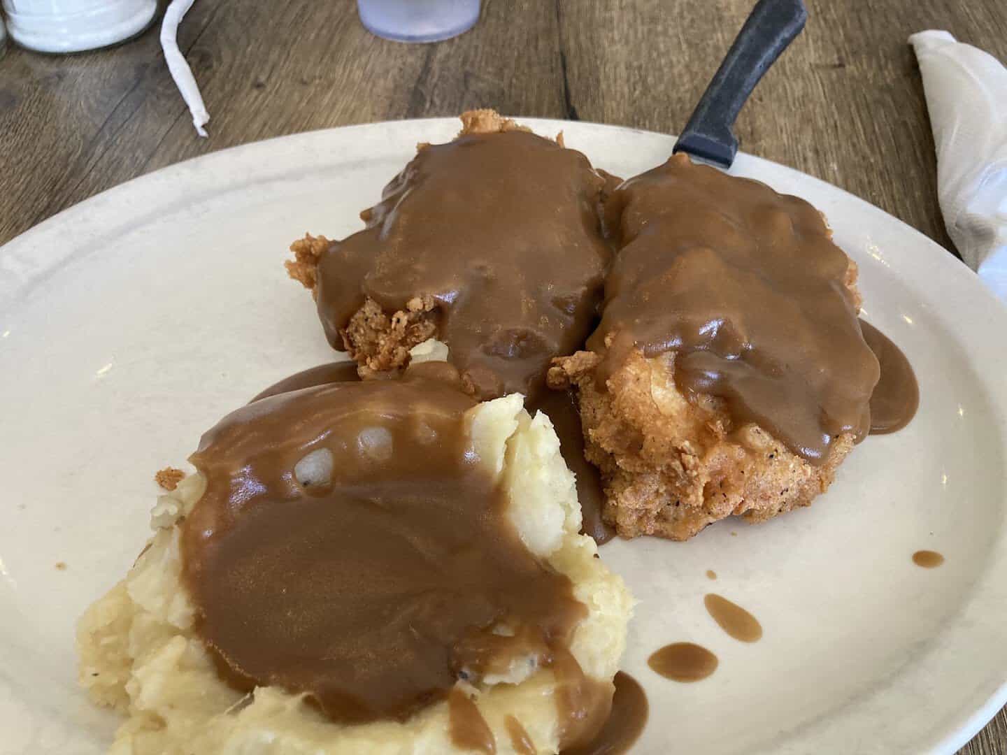 Chicken fried steak smothered in gravy at Bobbie's Southern Kitchen in San Antonio