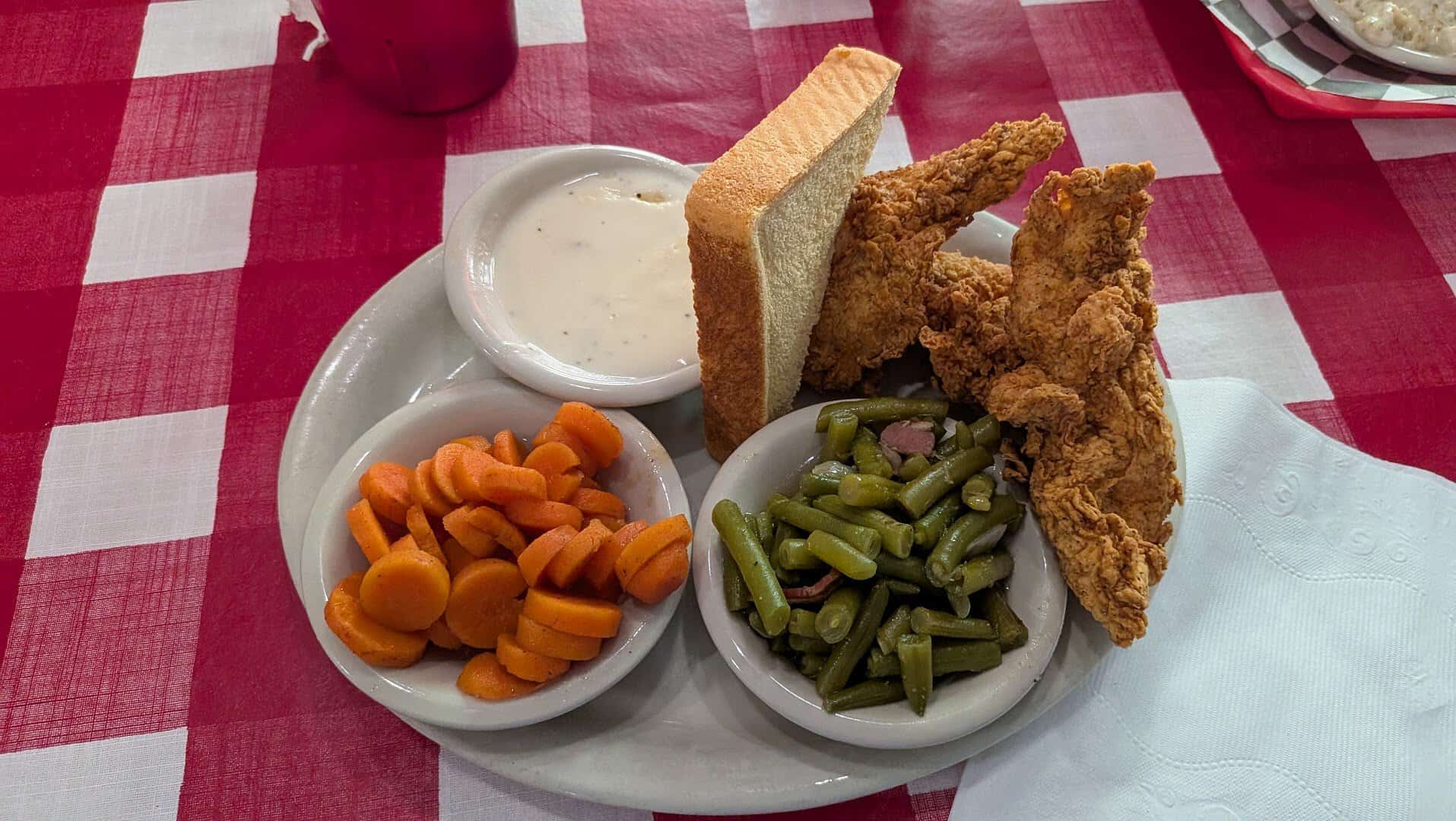 Chicken strips with carrots, green beans and toast at Texan Cafe and Pie Shop in Hutto, Texas