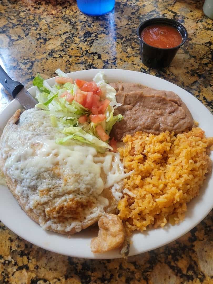 Chile relleno plate with rice and beans at Eddie's Taco House