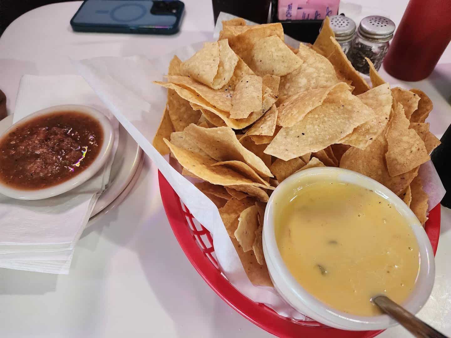 Chips with homemade salsa and queso at Roadhouse in Bastrop, Texas