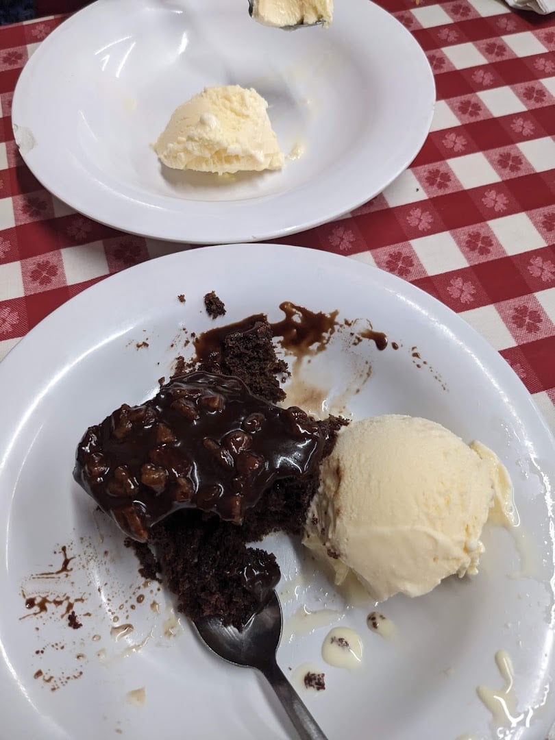 Warm chocolate cake topped with a scoop of vanilla ice cream at the Farm House in Mexia, Texas