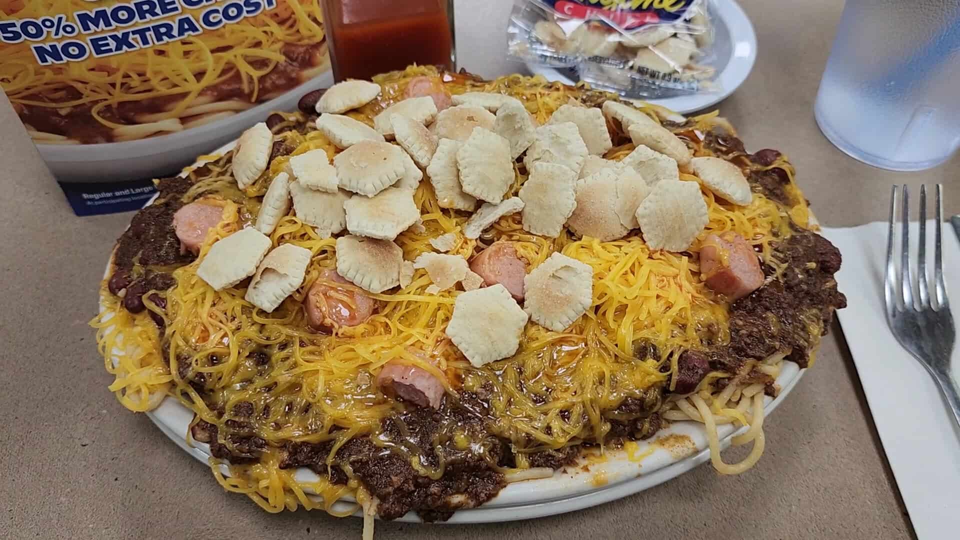 Cincinnati chili over spaghetti with cheese and coneys at Skyline Chili