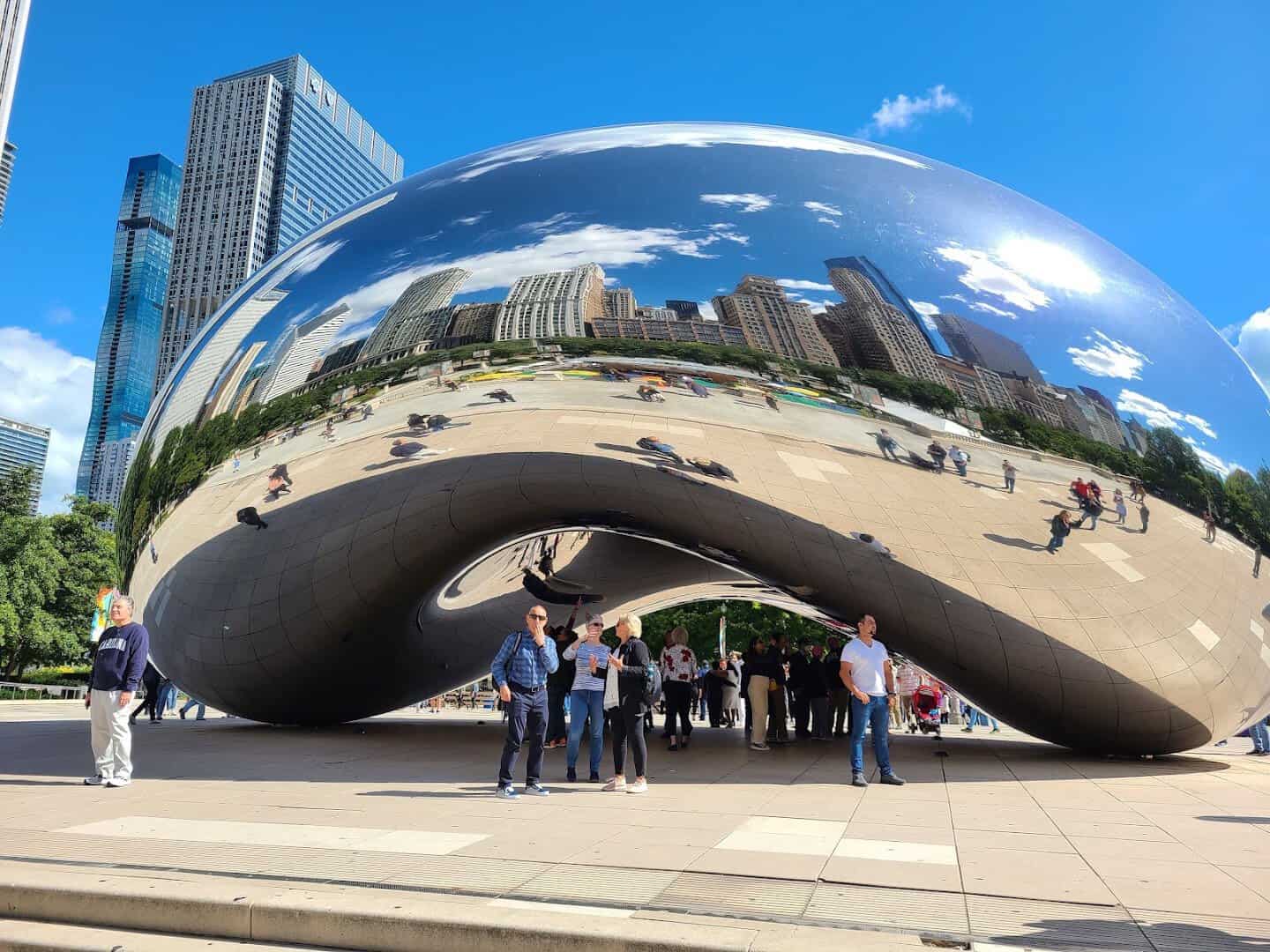 Cloud Gate, the Bean sculpture reflecting the skyline at Millennium Park in Chicago, Illinois