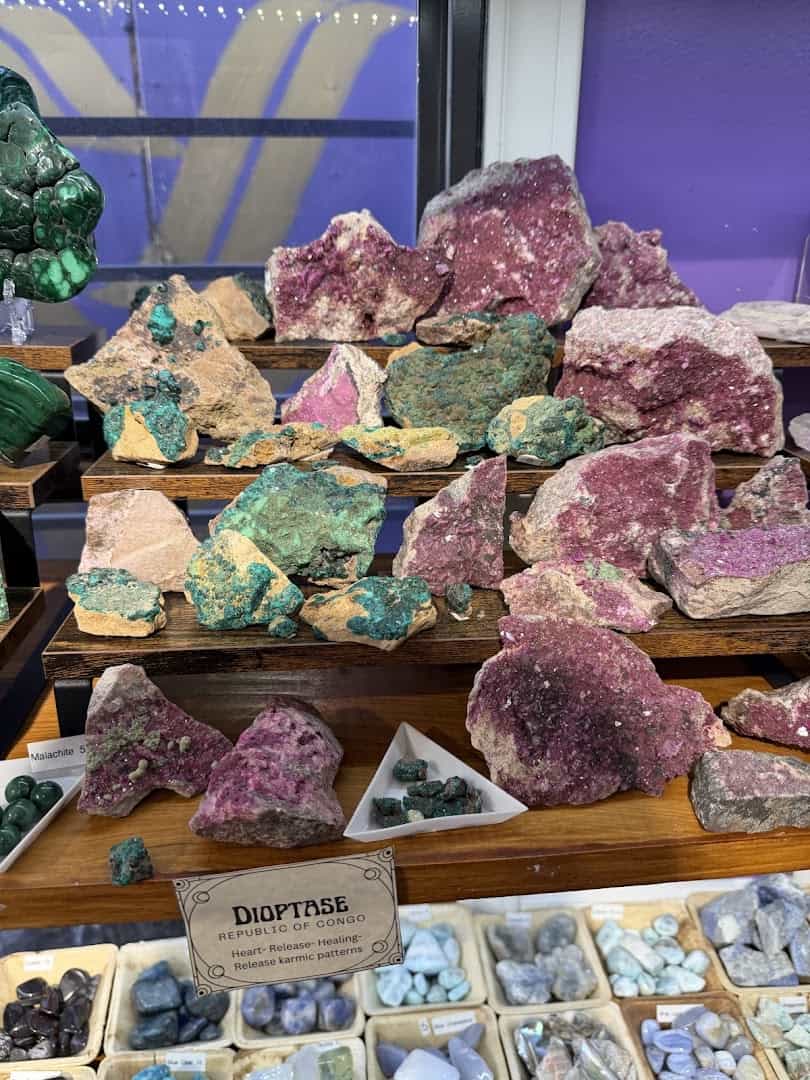 Colorful raw crystal specimens on display at Shiny Things For Shiny People in Austin